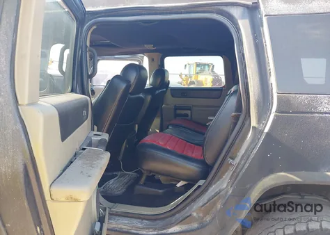 2003 Hummer H2 z USA, uszkodzony, nr VIN 5GRGN23UX3H140510